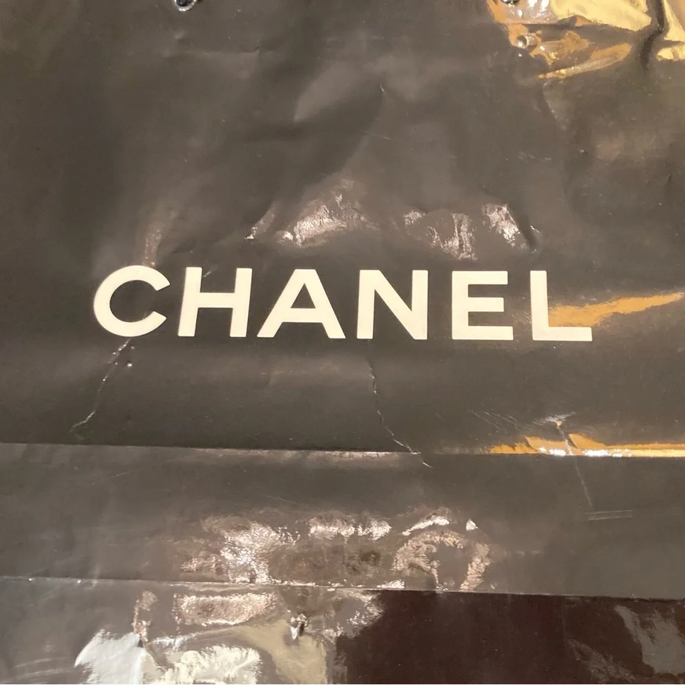 Chanel, high gloss glazed paper bag in black with White Chanel block letters